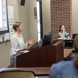 Nat Kroll gives her pitch during the final rounds of the 2023 Brugman Pitch Contest. 